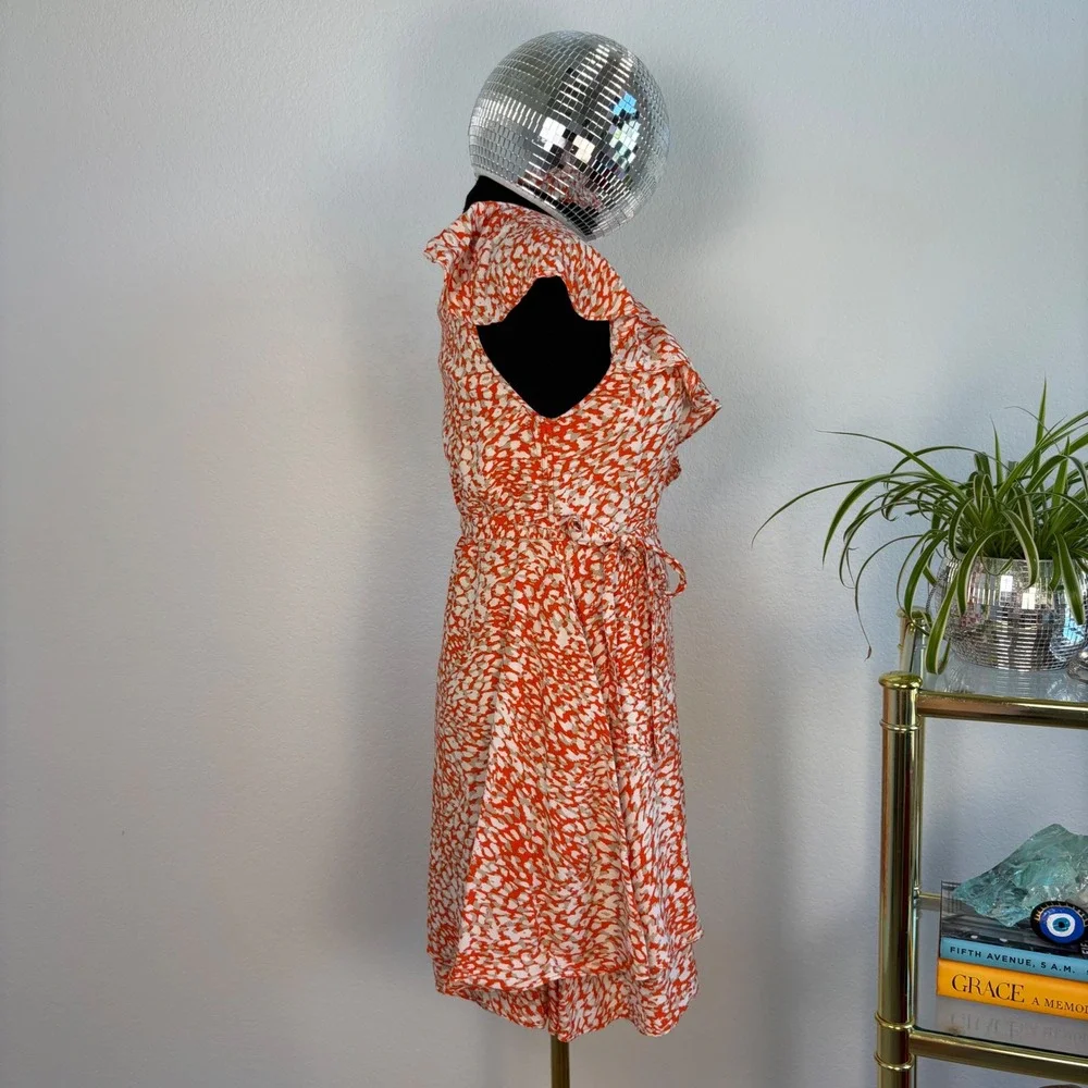 Free People French Quarter mini wrap dress, Small Orange White Animal Print boho